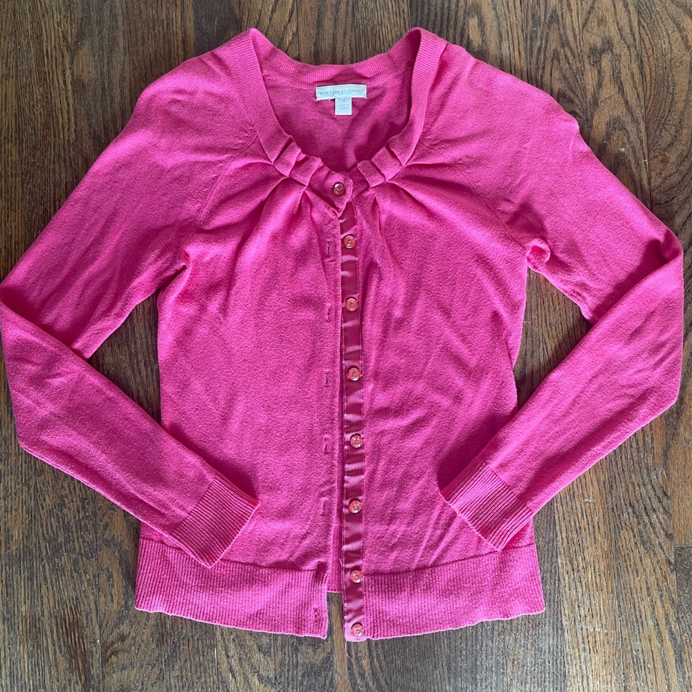 New York & Co pink cardigan. Preowned but still has life left. XS.